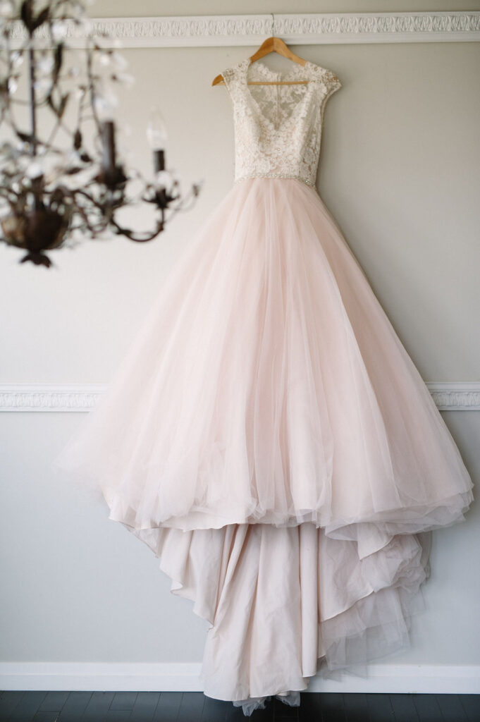 Blush High-Low Wedding Dress with Lace Bodice | Candè Bridal Boutique Kelowna